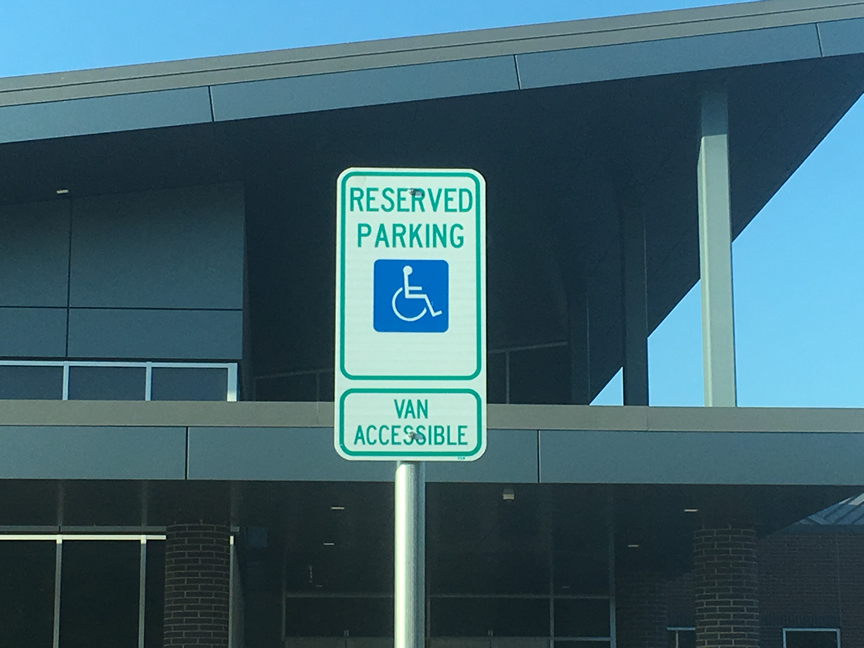 Metal Signs Installed In Parking Lots
