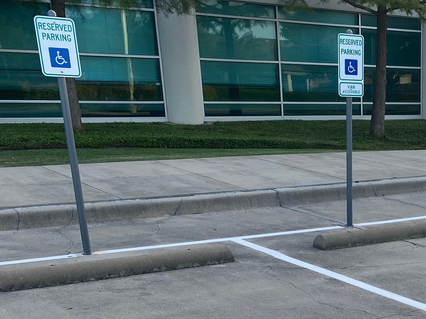Metal Sign Installation in Parking Lots