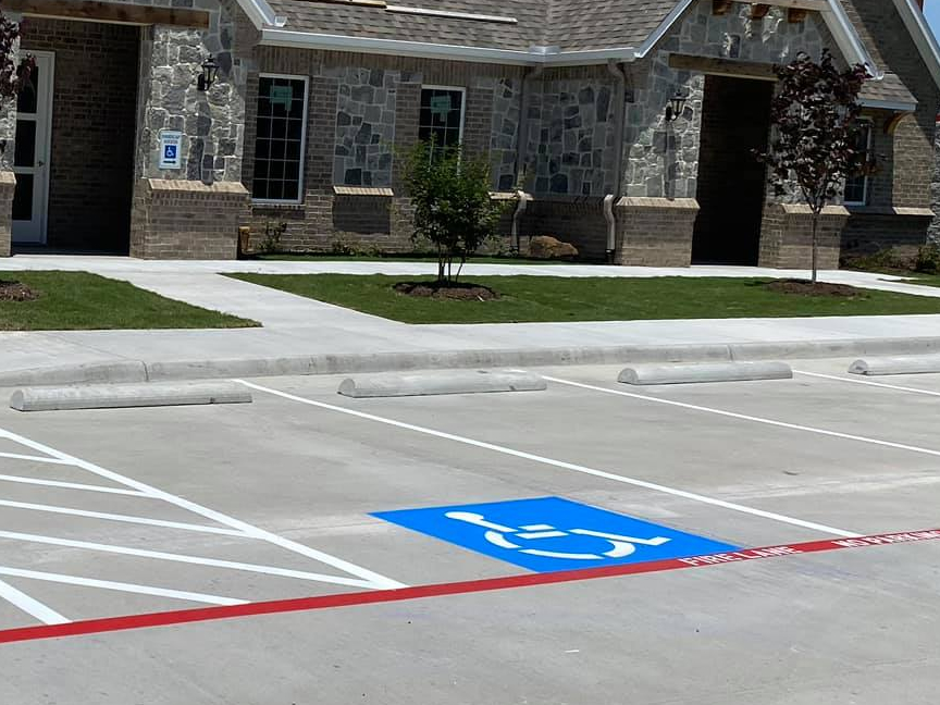 Wheelstops Installed In Your Parking Lot